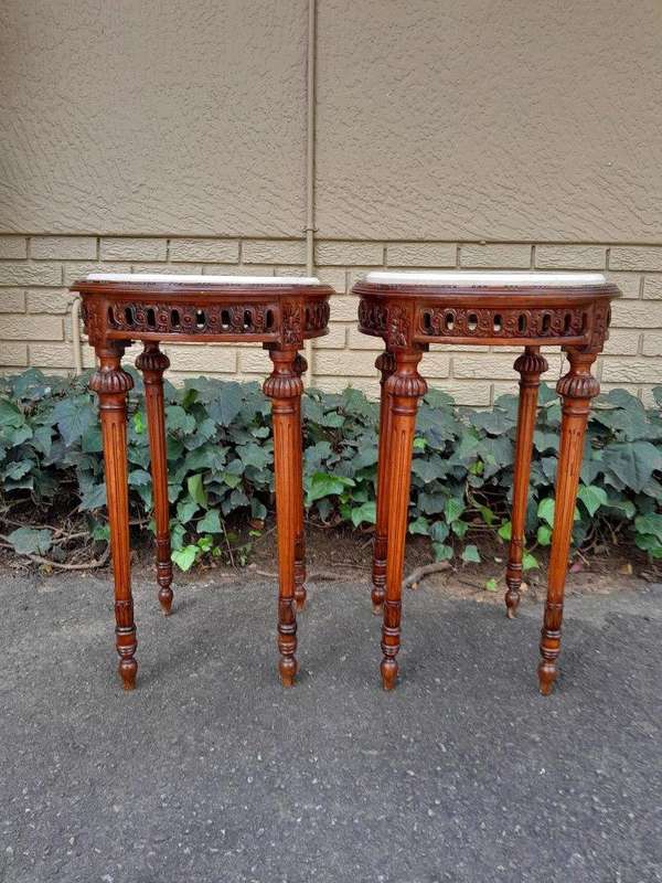 A 20th Century Pair of French Louis XVI Style Walnut and Marble Topped Side Table