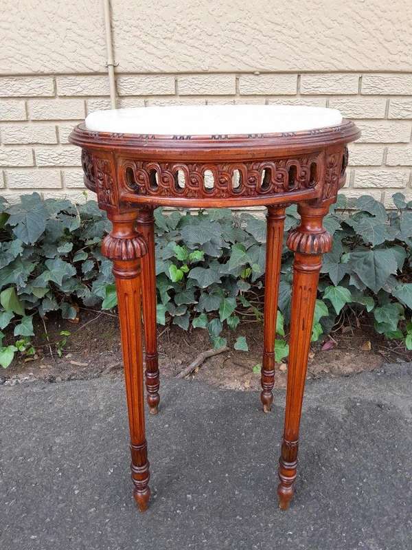 A 20th Century Pair of French Louis XVI Style Walnut and Marble Topped Side Table