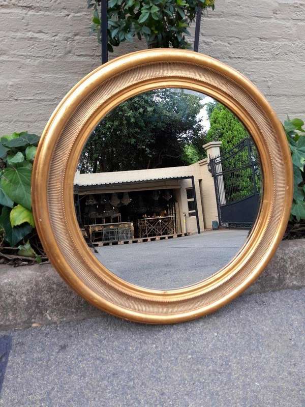 A 20th Century Gilt Painted Circular Mirror ND