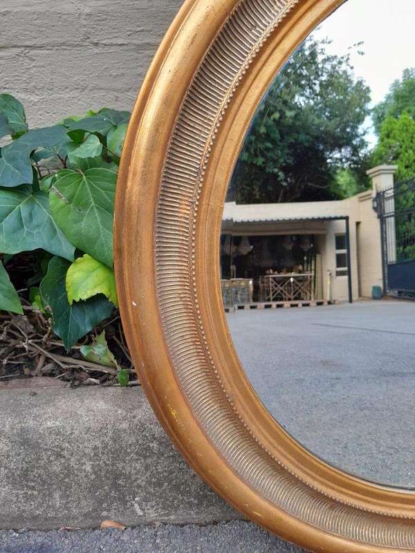 A 20th Century Gilt Painted Circular Mirror ND