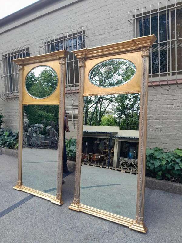 A 20th Century Rare Pair of French Louis XVI Style Gilt Painted Trumeau Bevelled Mirrors