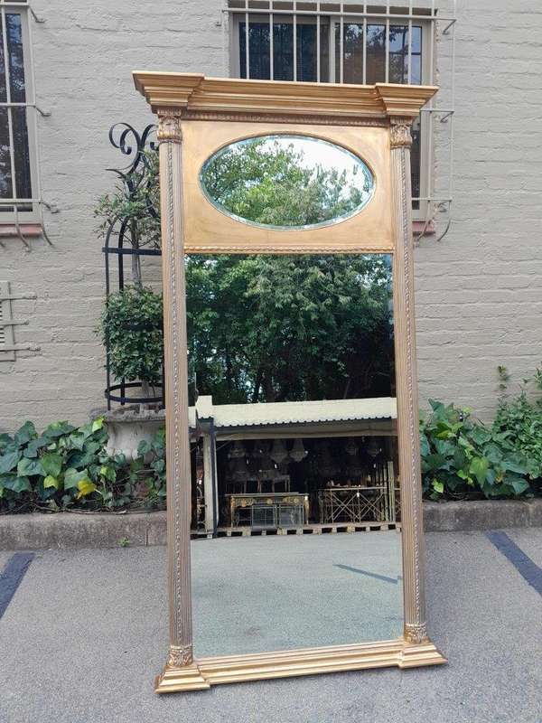 A 20th Century Rare Pair of French Louis XVI Style Gilt Painted Trumeau Bevelled Mirrors