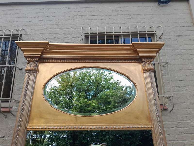 A 20th Century Rare Pair of French Louis XVI Style Gilt Painted Trumeau Bevelled Mirrors