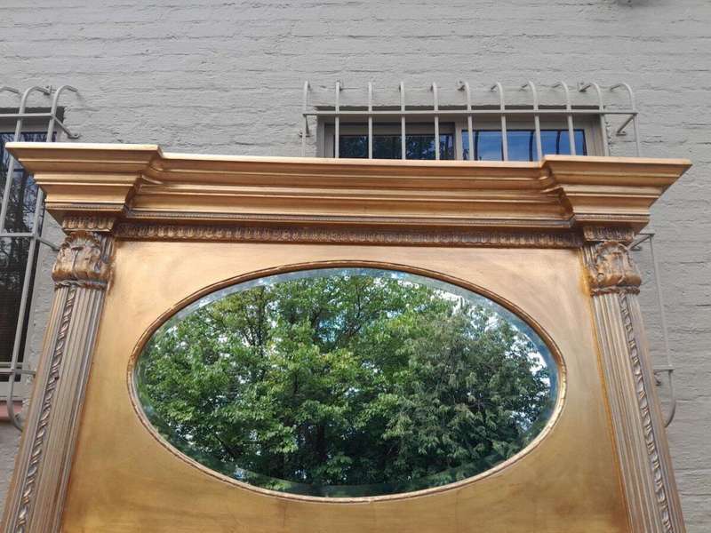 A 20th Century Rare Pair of French Louis XVI Style Gilt Painted Trumeau Bevelled Mirrors