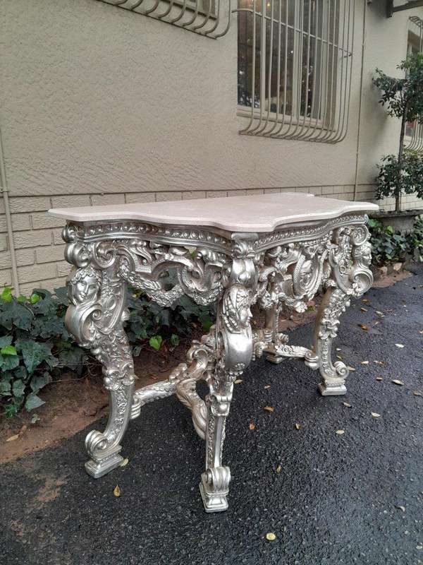 A 20th Century Ornately Carved Gilt Console / Drinks Table With Cream Marble Top