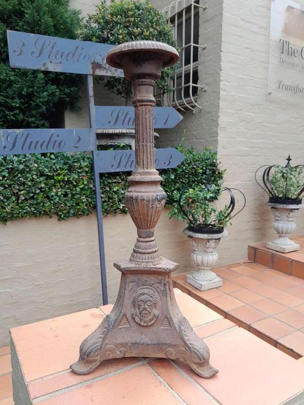 A 20th Century French Cast Iron Candle Holder