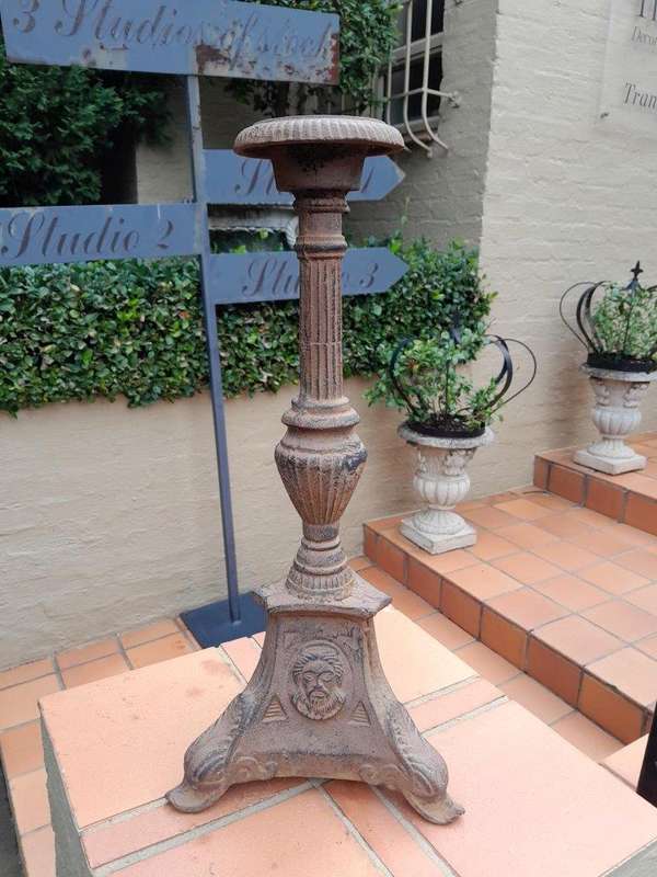 A 20th Century French Cast Iron Candle Holder