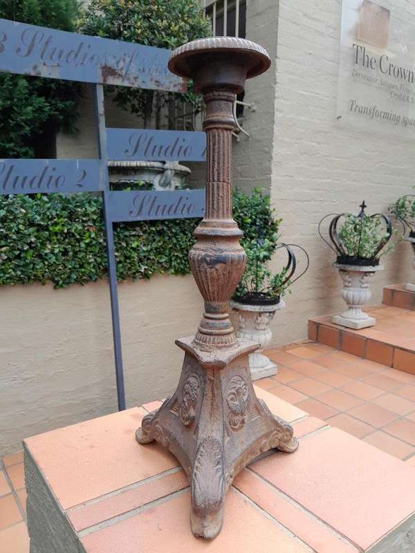 A 20th Century French Cast Iron Candle Holder