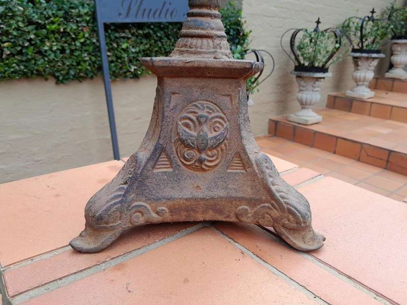 A 20th Century French Cast Iron Candle Holder