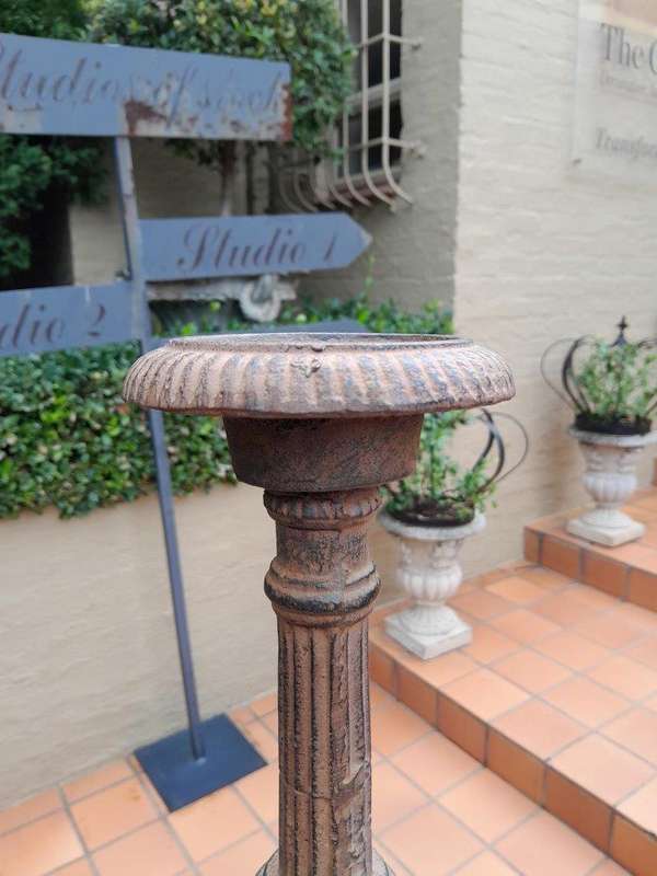 A 20th Century French Cast Iron Candle Holder
