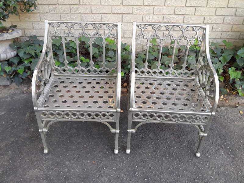 A Pair Of Designer Nickel Armchairs ND