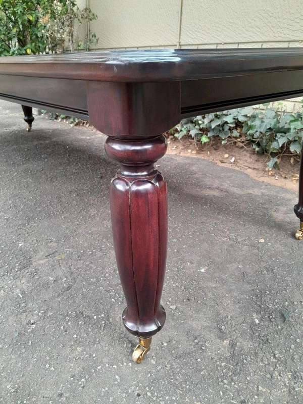 An Exceptional And Massive 20th Century Carved  Mahogany Dining Table On Large Brass Castors (14 ...