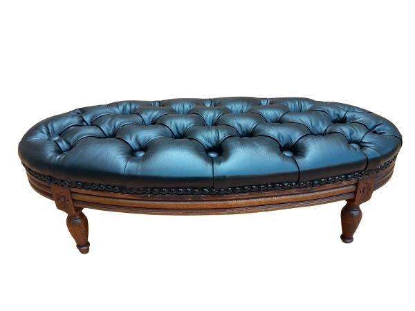 A 20th Century French Style Carved Beechwood Foot Stool Upholstered In Deep Buttoned Leather