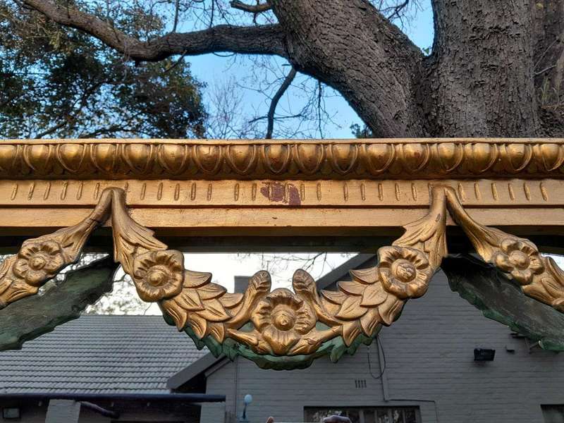 A 20th Century French Style Carved Giltwood Mirror Of Large Proportions