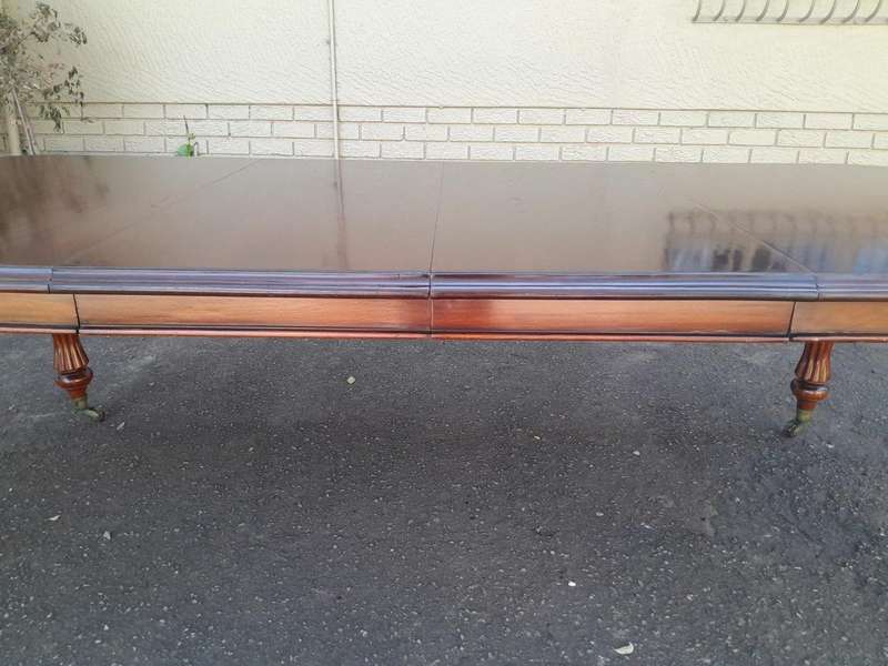 An Antique Victorian / Circa 1890s Dining Table With Two Leaves On Castors With A Crank Handle