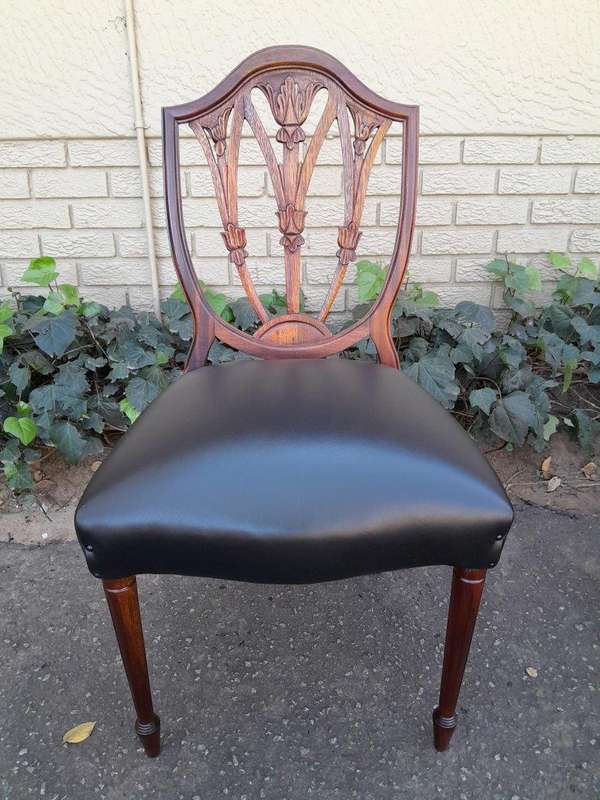 A 20th Century Set Of Eight Hepplewhite Style Dining Chairs With A Pair Of Armchairs / Carvers An...