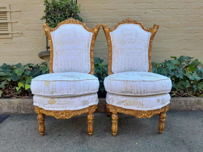 An Antique Early 20th Century French Pair Of Louis XV Style Heavily Carved Gilt Wood Slipper Chairs