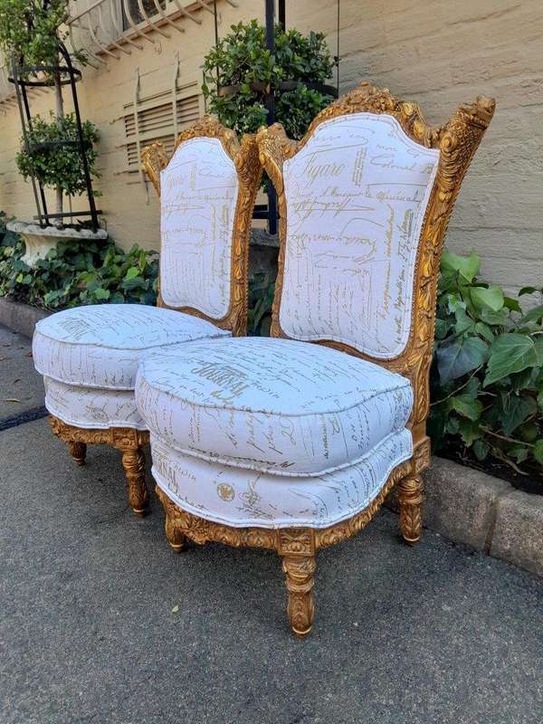 An Antique Early 20th Century French Pair Of Louis XV Style Heavily Carved Gilt Wood Slipper Chairs