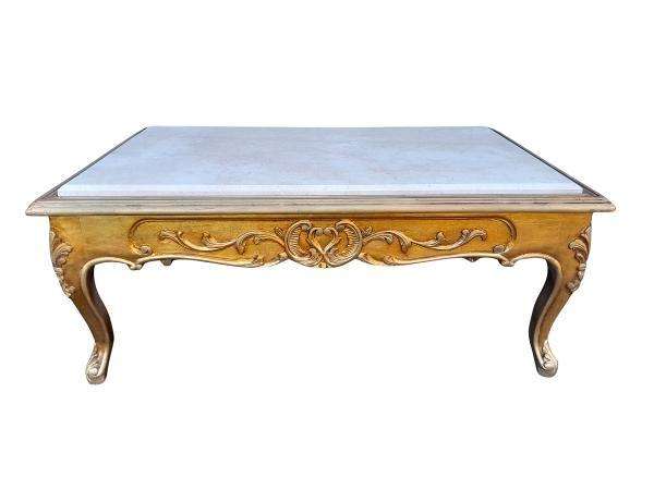 A 20th Century French Style Carved And Gilt Wood Coffee Table With Cream Marble Top
