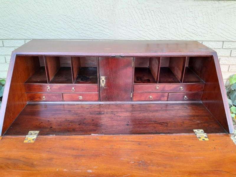 An Antique George III Flame Mahogany Bureau With Enclosed Fitted Interior, Brass Handles