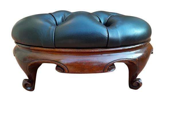 An Antique Circa 1880s Victorian Carved Mahogany Footstool Upholstered In Leather