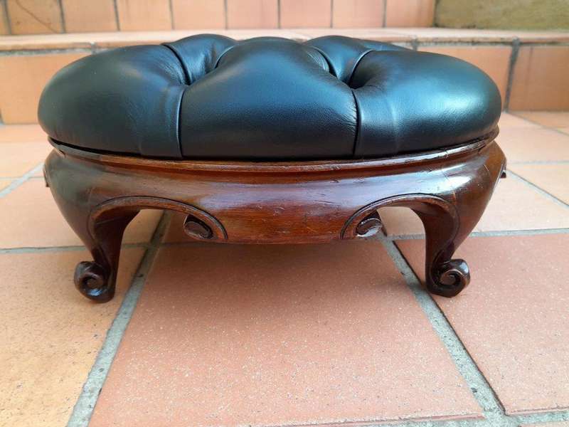 An Antique Circa 1880s Victorian Carved Mahogany Footstool Upholstered In Leather
