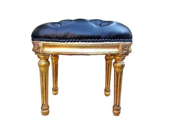 A 20th Century French-Style Beechwood Carved Footstool In A Hand Gilded Finish And Upholstered In...