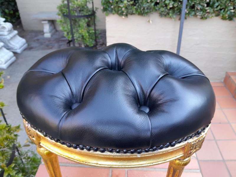 A 20th Century French-Style Beechwood Carved Footstool In A Hand Gilded Finish And Upholstered In...
