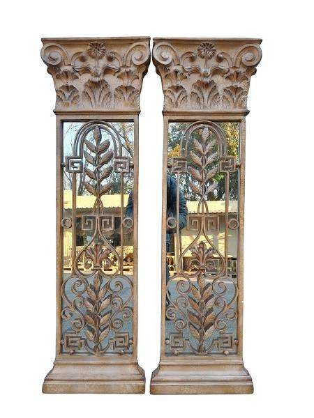 A 20th Century Pair Of Decorative Metal Plaque Style Mirrors