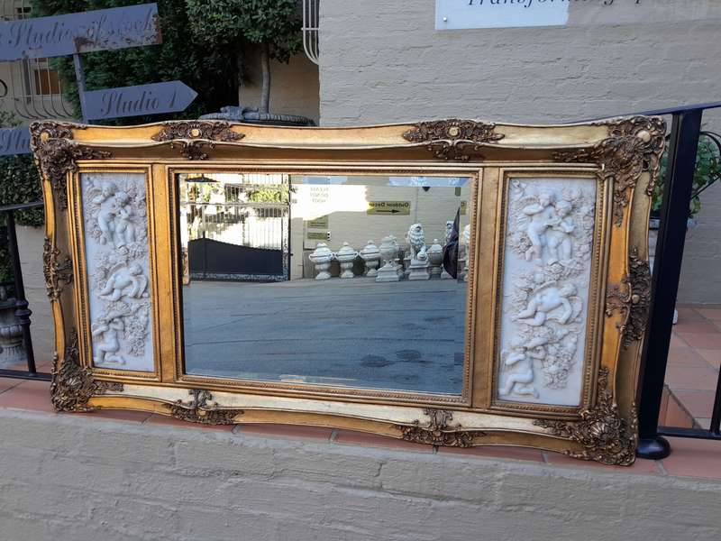A 20th Century Carved And Gilded Bevelled Mirror With Marble Plaques