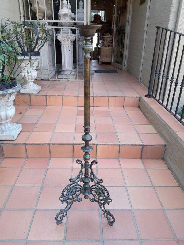An Antique Victorian Ornate Wrought Iron Candle Holder