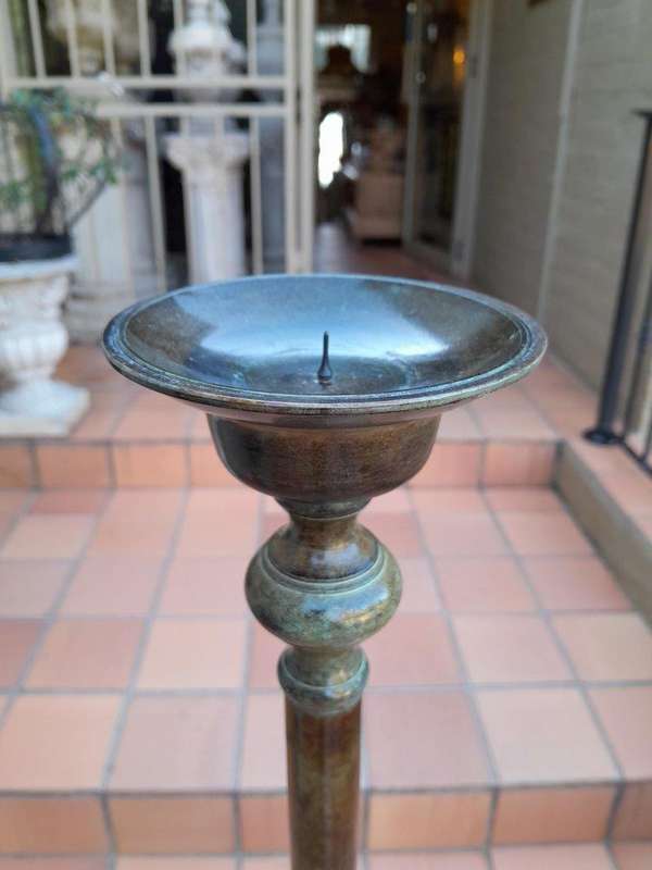An Antique Victorian Ornate Wrought Iron Candle Holder