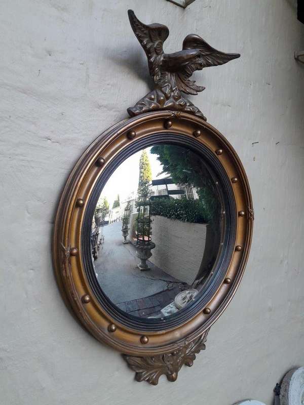 An Antique Regency Giltwood Convex Mirror