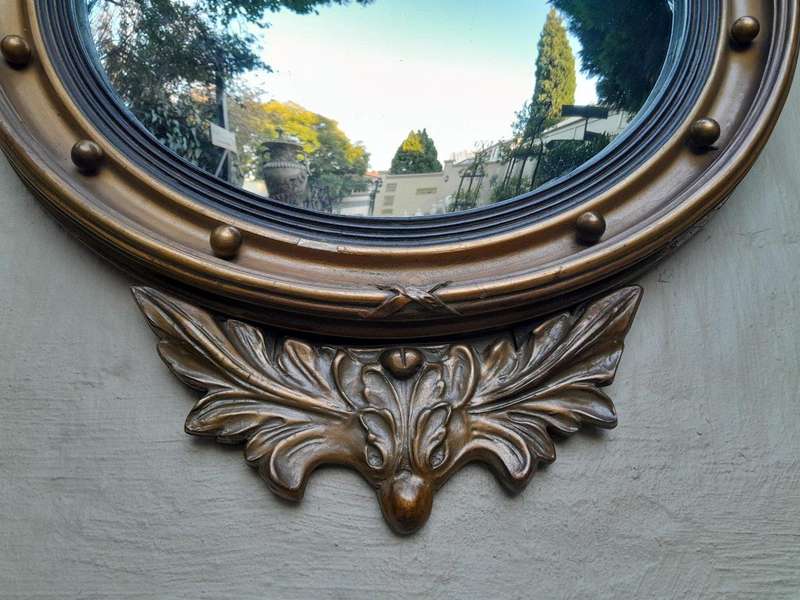 An Antique Regency Giltwood Convex Mirror