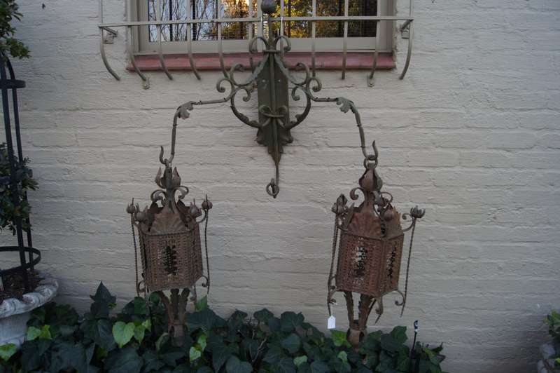 A decorative two arm wall light from a vineyard in the south of France. This piece has a good tim...