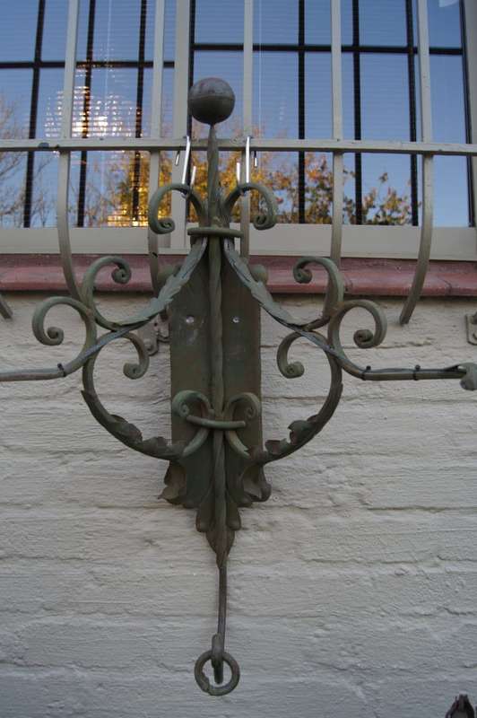 A decorative two arm wall light from a vineyard in the south of France. This piece has a good tim...