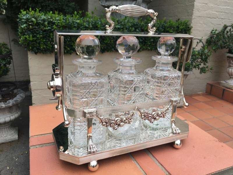 A Early 20th Century Edwardian Silver Plated Tantalus Circa 1901 To 1914 With Cut-Glass 3 Decanters