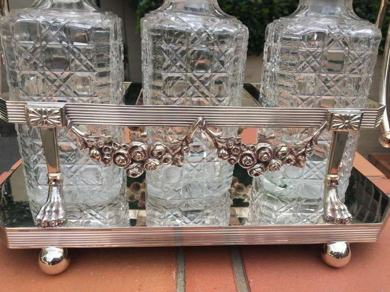 A Early 20th Century Edwardian Silver Plated Tantalus Circa 1901 To 1914 With Cut-Glass 3 Decanters