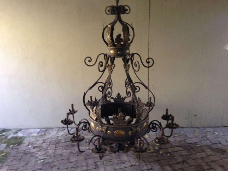 A Large Wrought Iron and Hand-Painted Imported Chandelier with Crown Detail