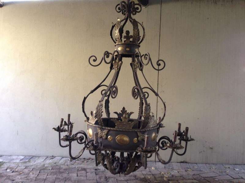 A Large Wrought Iron and Hand-Painted Imported Chandelier with Crown Detail