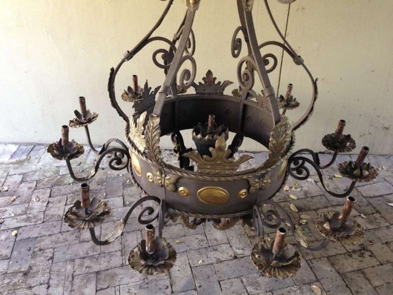 A Large Wrought Iron and Hand-Painted Imported Chandelier with Crown Detail