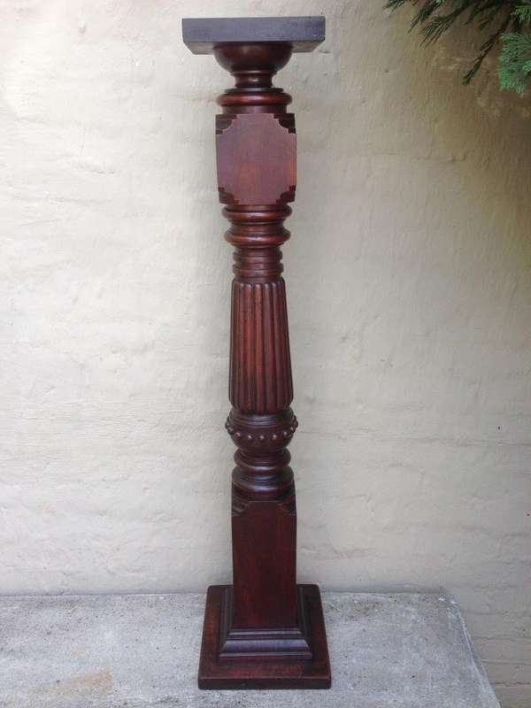 Carved mahogany pillar / plinth with fluted stem and square base
