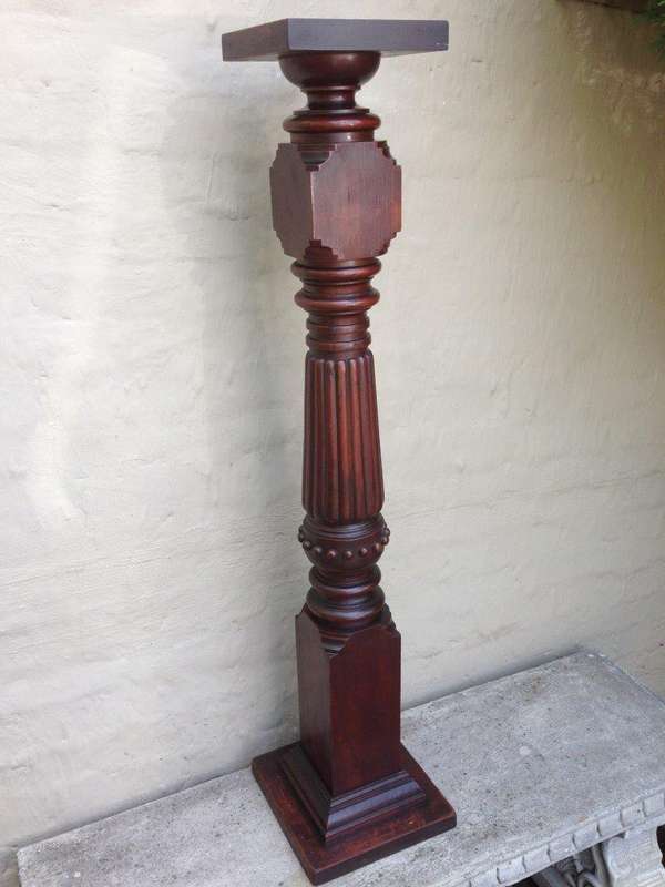 Carved mahogany pillar / plinth with fluted stem and square base
