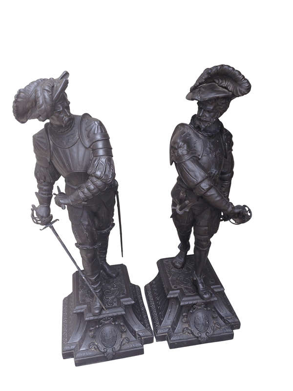A pair of late 19th Century / Early 20th Century spelter Cavalier Figures