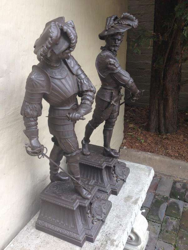 A pair of late 19thC/early 20thC spelter Cavalier Figures