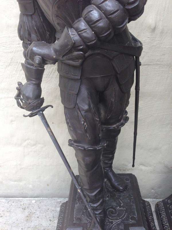A pair of late 19thC/early 20thC spelter Cavalier Figures