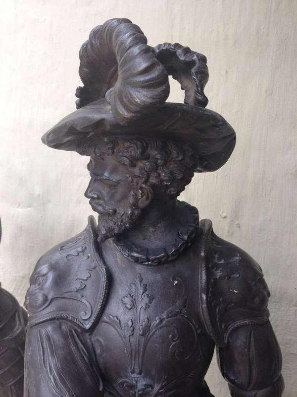 A pair of late 19thC/early 20thC spelter Cavalier Figures