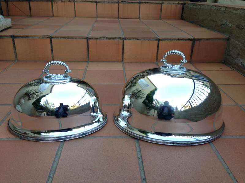 A Pair Of Graduated Silverplated Meat Domes By Walker & Hall   