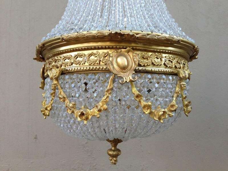 A 20th Century Empire Style Brass and Crystal Chandelier
