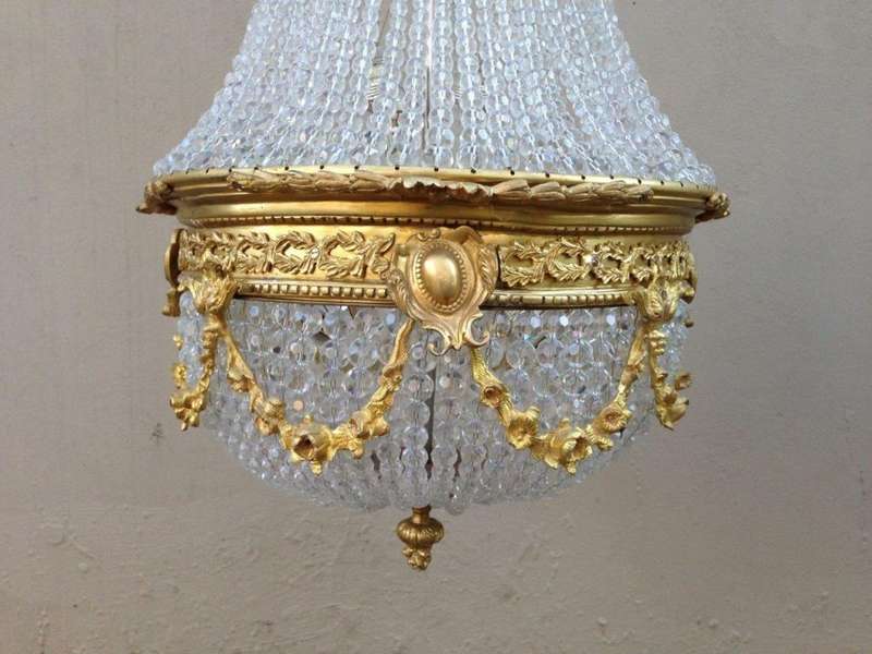 A 20th Century Empire Style Brass and Crystal Chandelier